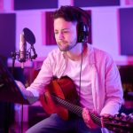 man-headphones-guitar-neon-studio-recording-production-performance-radio-mic-label-band-concert-guitarist-artist-thinking-musician-strings-instrument-night-light-practice