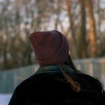 girl-with-hat-standing-forest-daytime_11zon