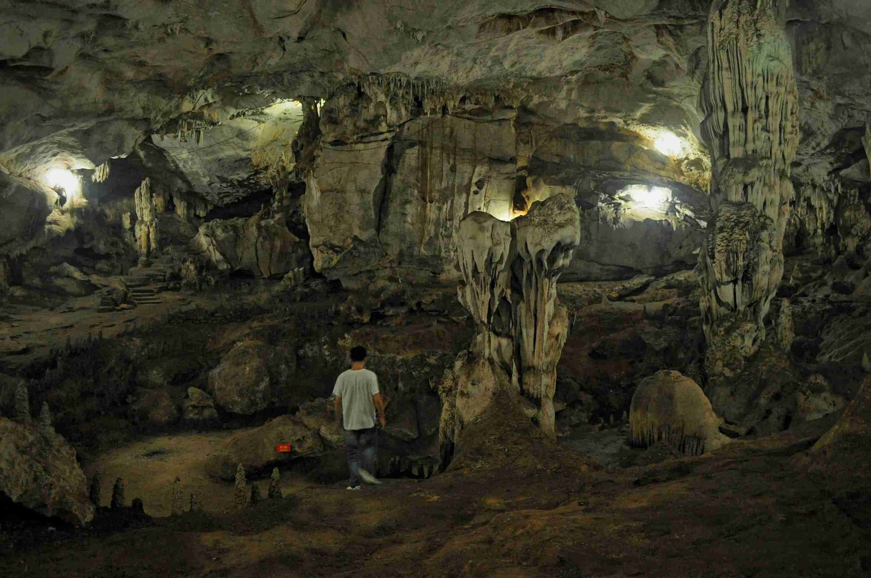 man-walking-cave_11zon