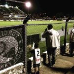 rear-view-man-standing-night (1)_11zon