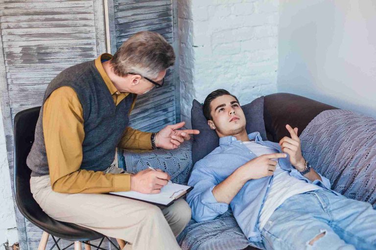 unhappy-male-patient-listening-psychologist-counselor-advice_11zon