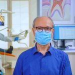 portrait-elderly-man-dental-office-looking-camera-wearing-face-mask-sitting-chair-waiting-room-stomatological-clinic-concept-new-normal-dentist-visit-coronavirus-outbreak_11zon