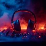 headphones-dj-mixer-with-red-blue-smoke_11zon