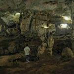 man-walking-cave_11zon